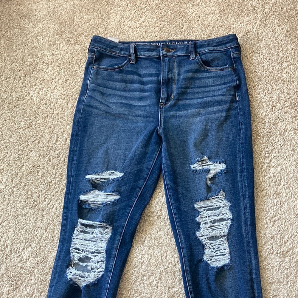 Ripped blue jeans